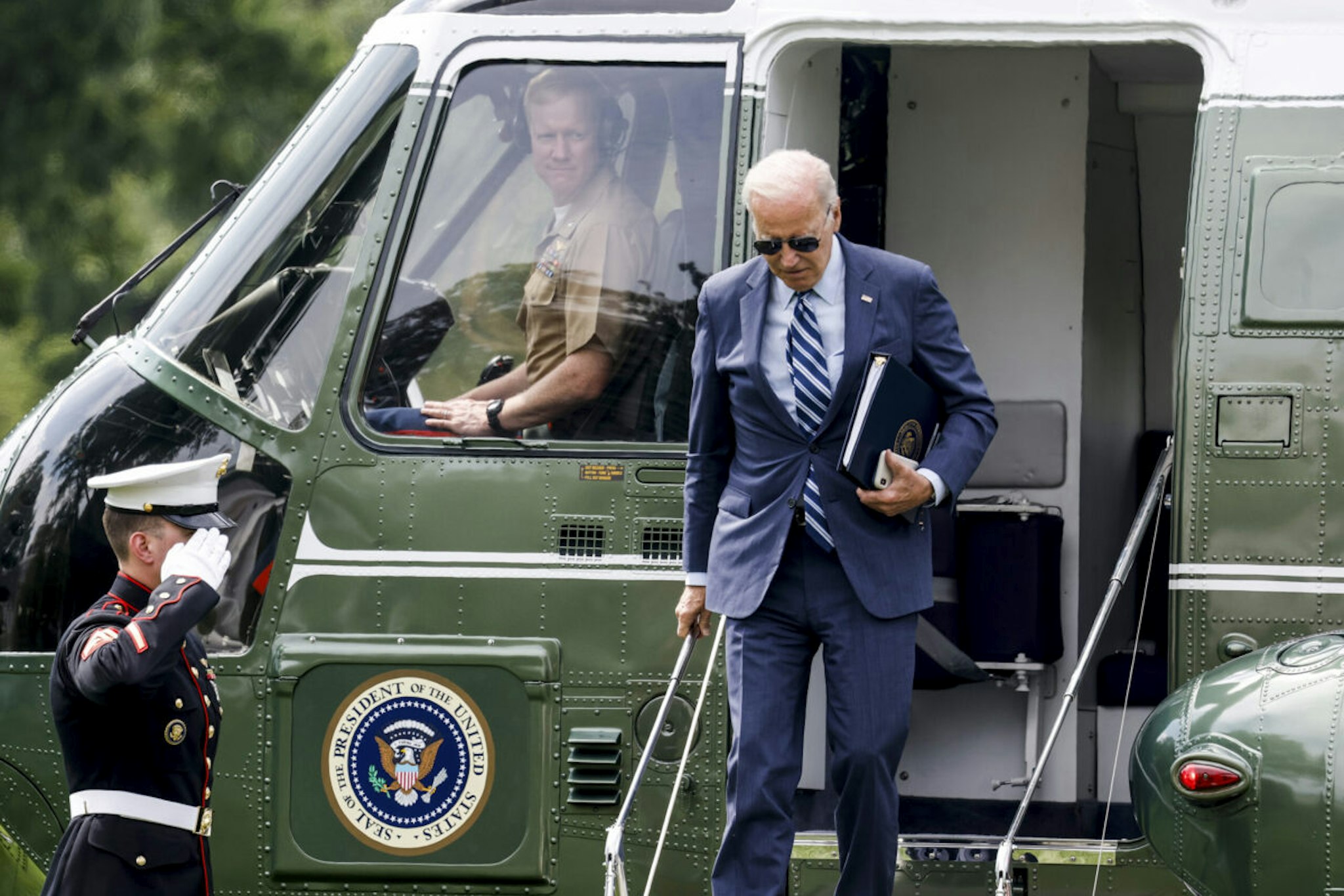 WASHINGTON, DC - AUGUST 14: U.S. President Joe Biden walks off Marine One on the South Lawn of the White House on August 14, 2023 in Washington, DC.