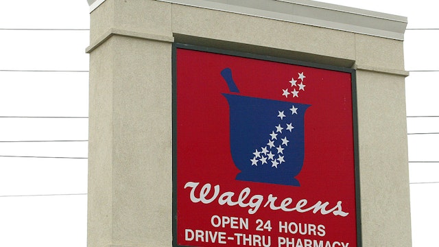 NILES, IL - JUNE 4: Walgreens signage is displayed outside a Walgreens store June 4, 2003 in Niles, Illinois. Deerfield, Illinois-based Walgreen Co. had May sales of $2,812,924,000, an increase of 12.3 percent from the same month in 2002. Sales in comparable stores, those open at least a year, rose 8.1 percent and May pharmacy sales increased 14.6 percent, while comparable pharmacy sales rose 10.9 percent. Total prescriptions filled at comparable stores increased 4.8 percent. Walgreens also opened 27 stores during May, including five relocations, and closed one store. On May 31 the company operated 4,050 drugstores in 43 states and Puerto Rico, versus 3,766 a year ago.