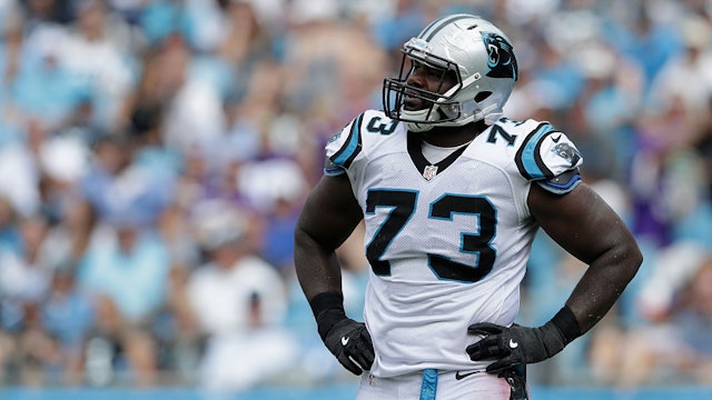 Michael Oher #73 of the Carolina Panthers watches a replay against the Minnesota Vikings in the 3rd quarter during their game at Bank of America Stadium on September 25, 2016 in Charlotte, North Carolina.