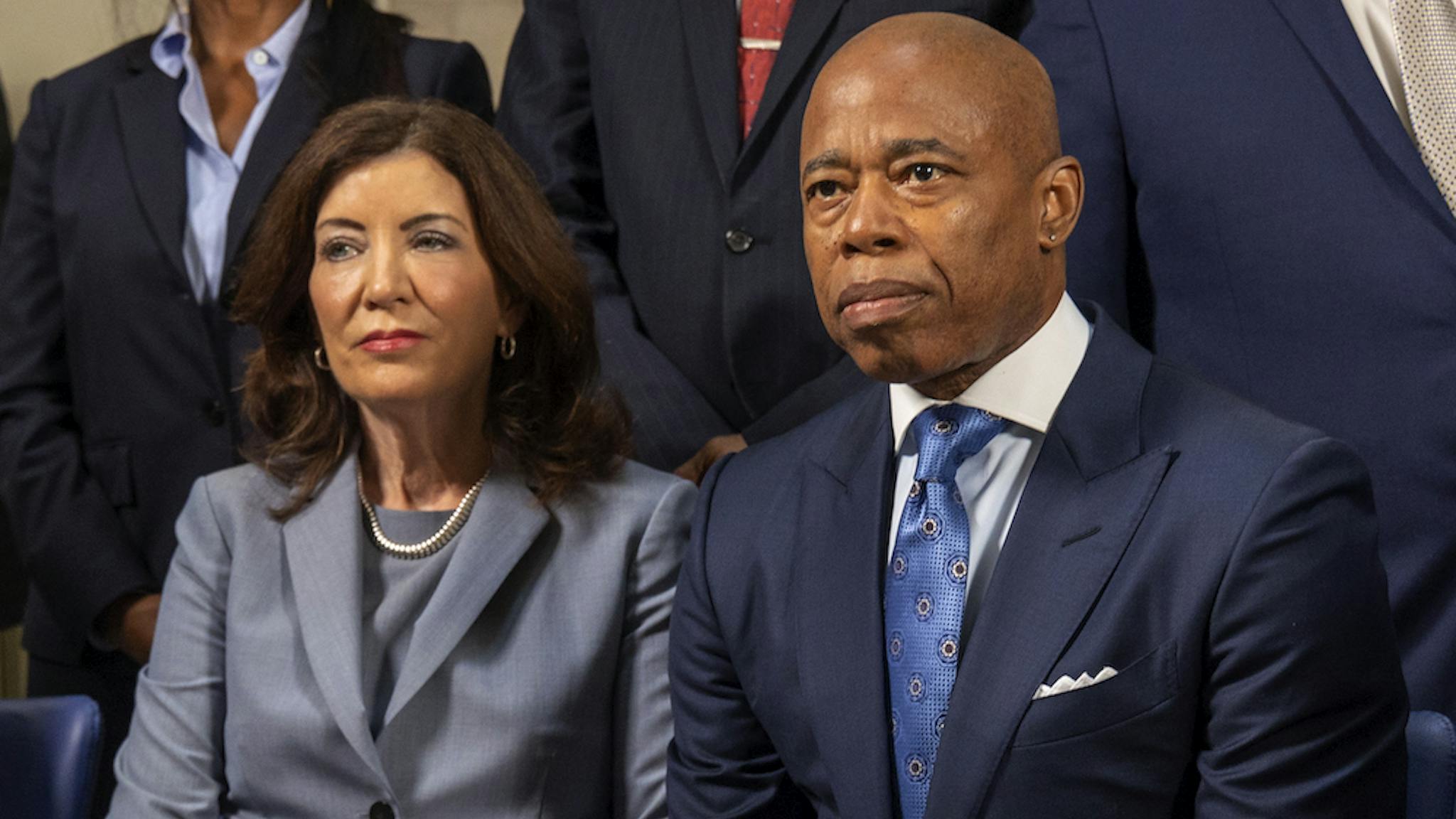 Kathy Hochul, Eric Adams UNITED STATES -July 31: Mayor Eric Adams seated next to New York Governor Kathy Hochul (C) and NY State Attorney General Letitia James are pictured during press conference and release of the New York City Gun Violence Prevention Task Force "A Blueprint for Community Safety," outlining a forward-thinking roadmap with upstream solutions to address gun violence throughout the five boroughs. City Commissioners, and civilian partners attended the event at the City Hall Rotunda Monday July, 31, 2023. (Photo by Luiz C. Ribeiro for NY Daily News via Getty Images)