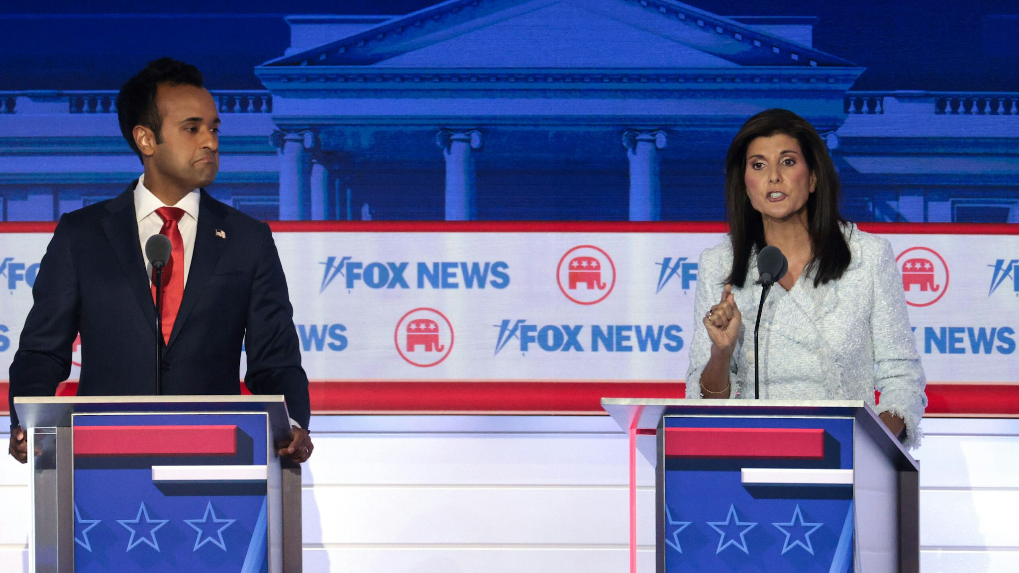 MILWAUKEE, WISCONSIN - AUGUST 23: Republican presidential candidates (L-R), Vivek Ramaswamy and former U.N. Ambassador Nikki Haley participate in the first debate of the GOP primary season hosted by FOX News at the Fiserv Forum on August 23, 2023 in Milwaukee, Wisconsin. Eight presidential hopefuls squared off in the first Republican debate as former U.S. President Donald Trump, currently facing indictments in four locations, declined to participate in the event.