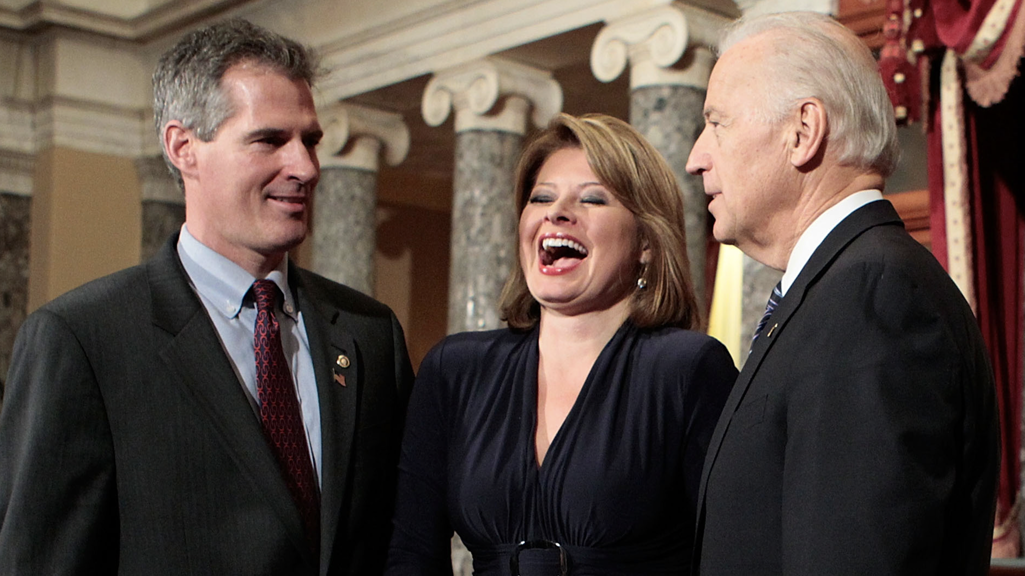 WASHINGTON - FEBRUARY 04: Gail Huff (C), wife of U.S. Senator Scott Brown (R-MA) (L), laughs as Brown participates in a ceremonial swearing-in with Vice President Joseph Biden (R) February 4, 2010 on Capitol Hill in Washington, DC.
