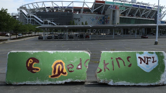 LANDOVER, MARYLAND - JULY 13: Hand painted concrete barriers stand in the parking lot of FedEx Field, home of the NFL's Washington Redskins team July 13, 2020 in Landover, Maryland. The team announced Monday that owner Daniel Snyder and coach Ron Rivera are working on finding a replacement for its racist name and logo after 87 years.