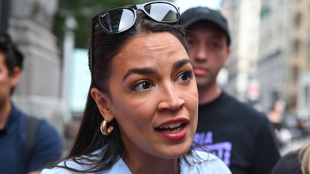 NEW YORK, NY - JULY 24: Alexandria Ocasio-Cortez walks the picket line in support of the SAG-AFTRA and WGA strike on July 24, 2023 in New York City.