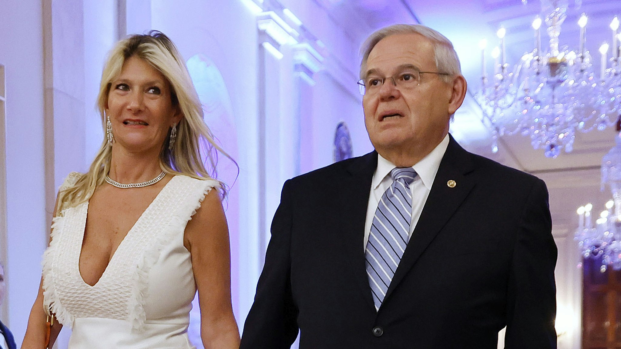 WASHINGTON, DC - MAY 16: U.S. Senate Foreign Relations Committee Chairman Bob Menendez (D-NJ) and his wife Nadine Arslanian arrive for a reception honoring of Greek Prime Minister Kyriakos Mitsotakis and his wife Mareva Mitsotakis in the East Room of the White House on May 16, 2022 in Washington, DC. President Joe Biden hosted Mitsotakis for bilateral meetings earlier in the day where they discussed allied efforts to "support the people of Ukraine and impose economic costs on Russia for its unprovoked aggression," according to the White House.