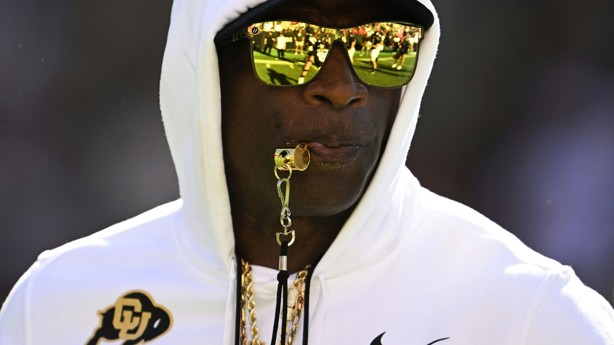 BOULDER, COLORADO - AUGUST 9: Head Coach Deion Sanders takes the field during warmups at Folsom Field on September 9, 2023 in Boulder, Colorado. Coach Sanders will lead the Colorado Buffaloes in a matchup against their long-time rivals, the Nebraska Cornhuskers, during Coach Prime's highly anticipated home debut.