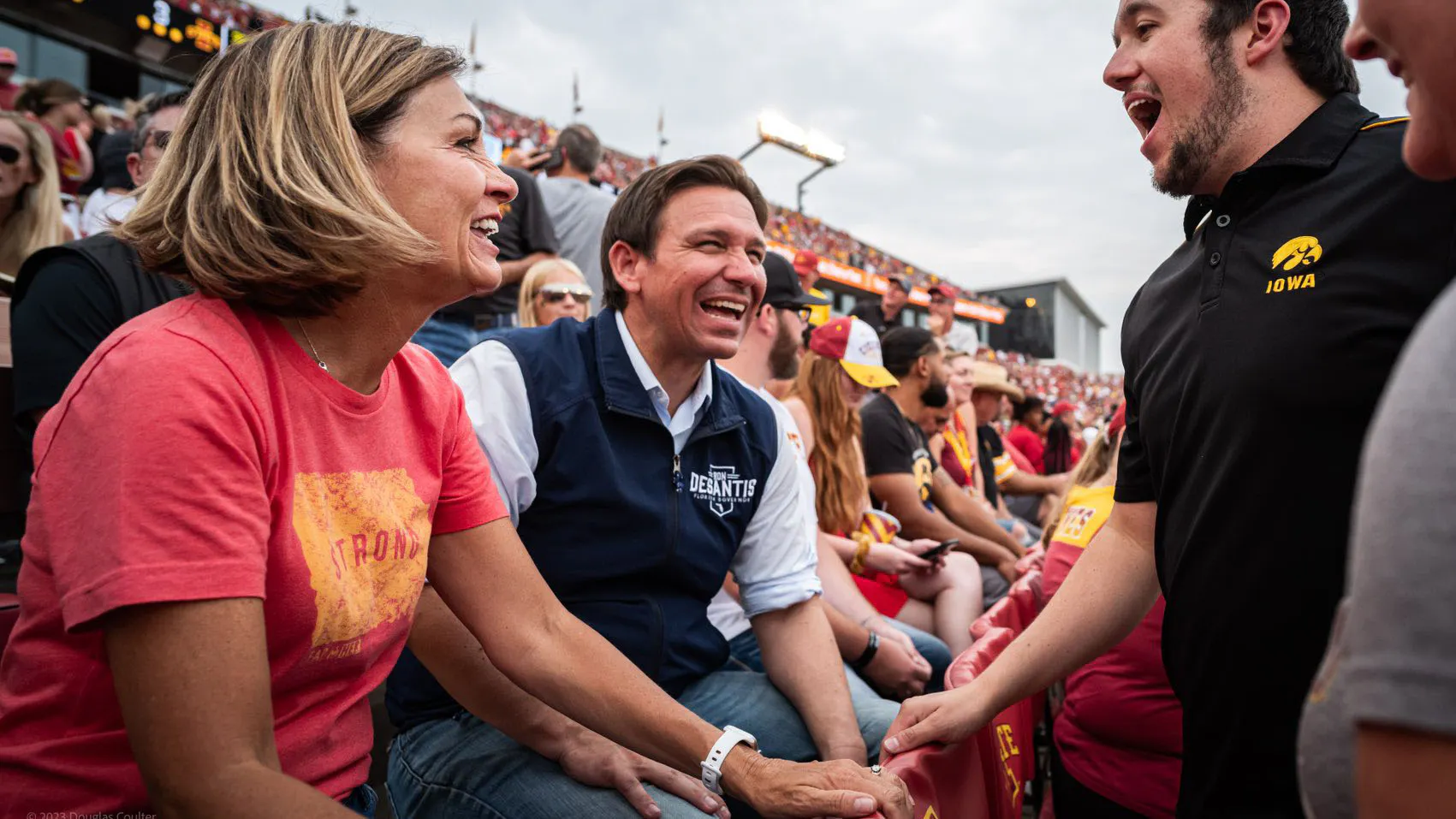 DeSantis Sits In Crowd With Governor Reynolds At Iowa-Iowa State Game