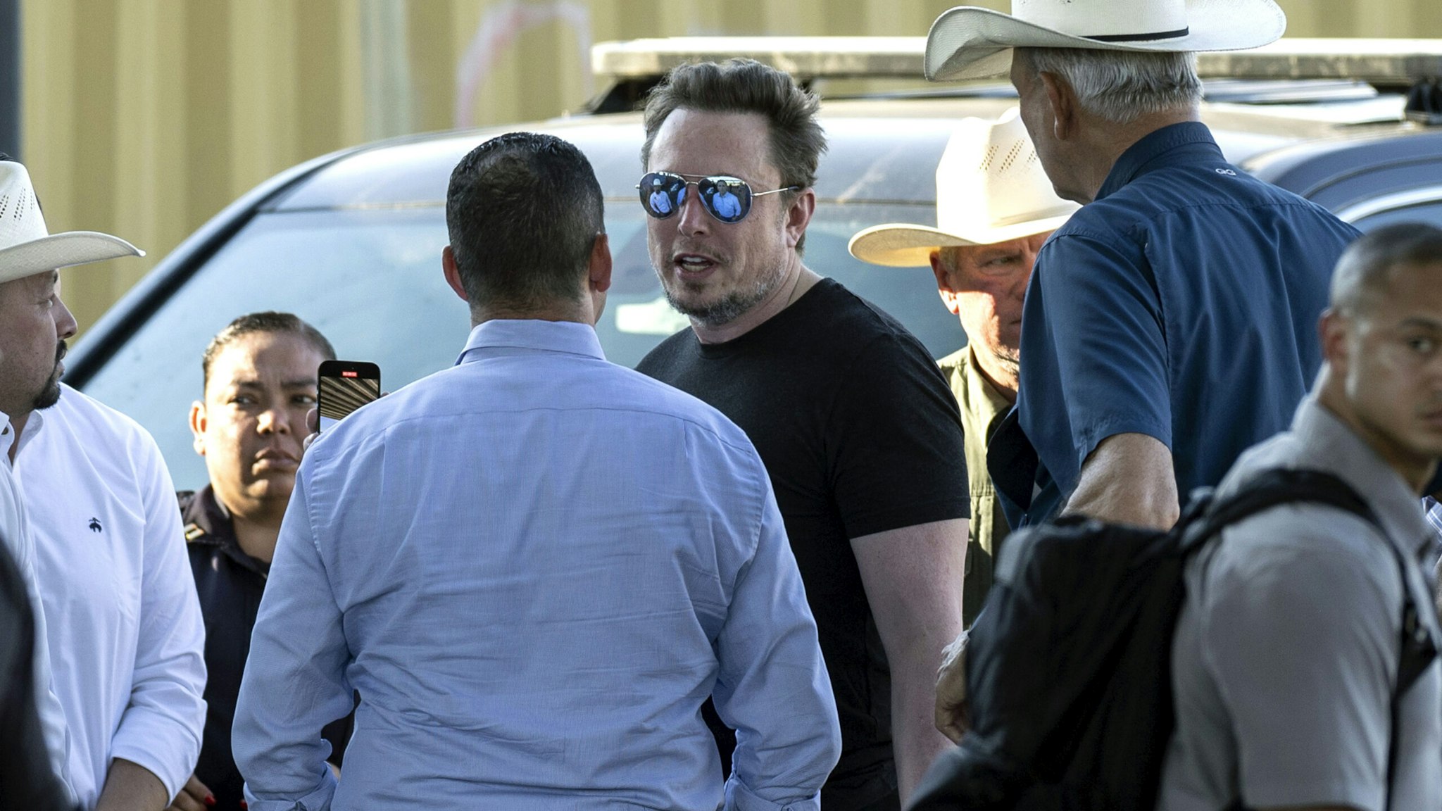EAGLE PASS, TEXAS - SEPTEMBER 28: Tech entrepreneur Elon Musk with Rep. Tony Gonzales (R-TX) while visiting the Texas-Mexico border on September 28, 2023 in Eagle Pass, Texas. Musk toured the border along the bank of the Rio Grande to see firsthand the ongoing migrant crisis, which he has called a "serious issue."