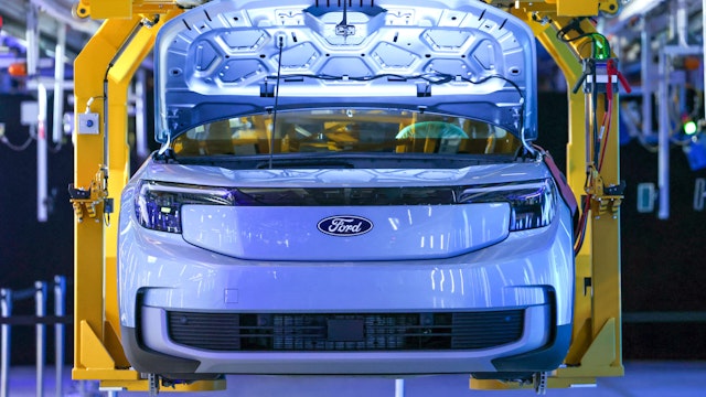 A fully electric Ford Explorer sports utility vehicle (SUV) on an assembly line during the opening ceremony of the Ford Motor Co. Cologne Electric Vehicle Center, following a $2 billion modernization program, in Cologne, Germany, on Monday, June 12, 2023. After years of falling market share in Europe, Ford plans to only manufacture EVs in the region by the end of the decade.