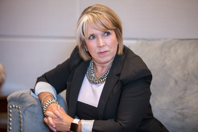 Michelle Lujan Grisham, governor of New Mexico, listens during an interview at her office in Santa Fe, New Mexico, U.S., on Thursday, Aug. 8, 2019. Lujan Grisham is balancing her concern over the catastrophic effects of climate change with the state's extraordinary dependence on oil and gas. Photographer: Steven St John/Bloomberg via Getty Images