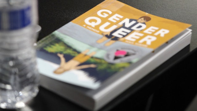 &quot;Gender Queer,&quot; a graphic novel about a nonbinary teen sits on a table during the Barrington District 220 school board meeting on Aug. 16, 2022, in Barrington. The book is a 2019 graphic memoir written and illustrated by Maia Kobabe. (H. Rick Bamman/Pioneer Press/Chicago Tribune/Tribune News Service via Getty Images)