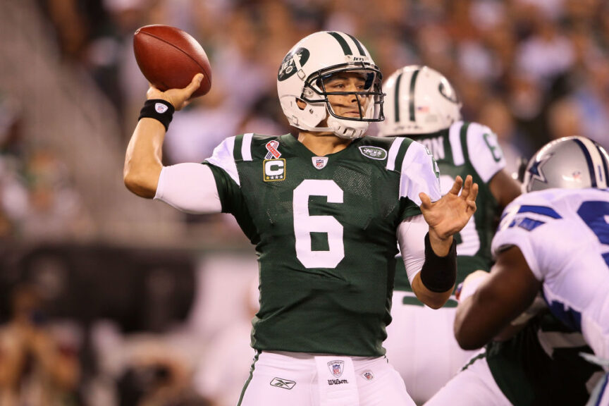 EAST RUTHERFORD, NJ - SEPTEMBER 11: Mark Sanchez #6 of the New York Jets throws a pass against the Dallas Cowboys in the first half during their NFL Season Opening Game at MetLife Stadium on September 11, 2011 in East Rutherford, New Jersey. (Photo by Elsa/Getty Images)