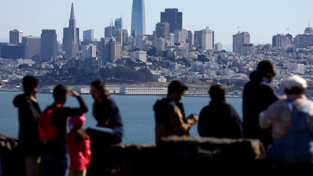 SAUSALITO, CALIFORNIA - OCTOBER 24: Visitors look at the San Francisco skyline from a vista point on October 24, 2022 in Sausalito, California. The State of California, currently the fifth largest economy in the world, is likely to overtake Germany as the fourth largest economy in the near future as the state's gross domestic product is continuing to rise with steady growth. (Photo by Justin Sullivan/Getty Images)