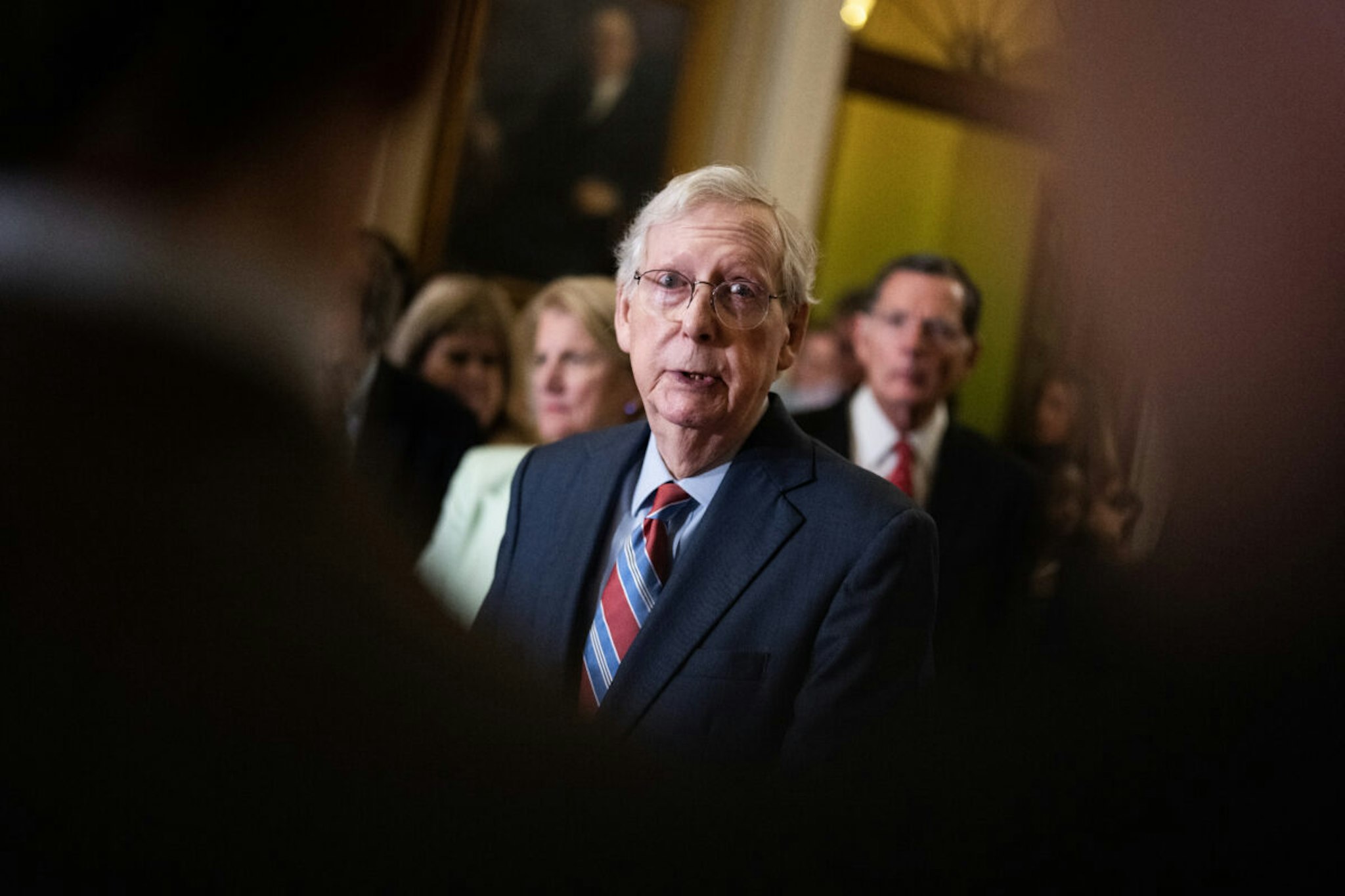 Senate Minority Leader Mitch McConnell, R-Ky., takes questions after taking a break from a news conference because of lightheadedness, after the senate luncheons on Wednesday, July 26, 2023.