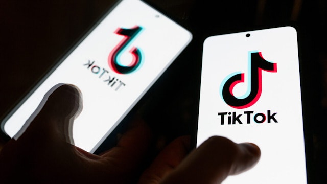 POLAND - 2023/08/01: In this photo illustration, a TikTok logo seen displayed on a smartphone.