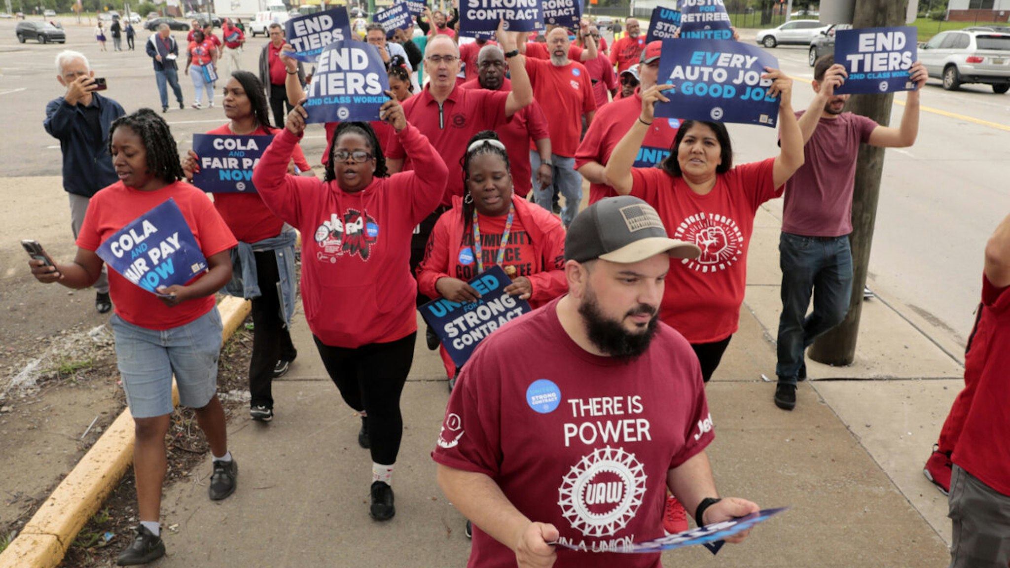 Demonstrators during a United Auto Workers (UAW) practice picket outside the Stellantis Mack Assembly Plant in Detroit, Michigan, US, on Wednesday, Aug. 23, 2023. The union is locked in tough contract talks with Detroit's Big Three automakers, and a work stoppage is possible when their current agreement expires on Sept. 14.