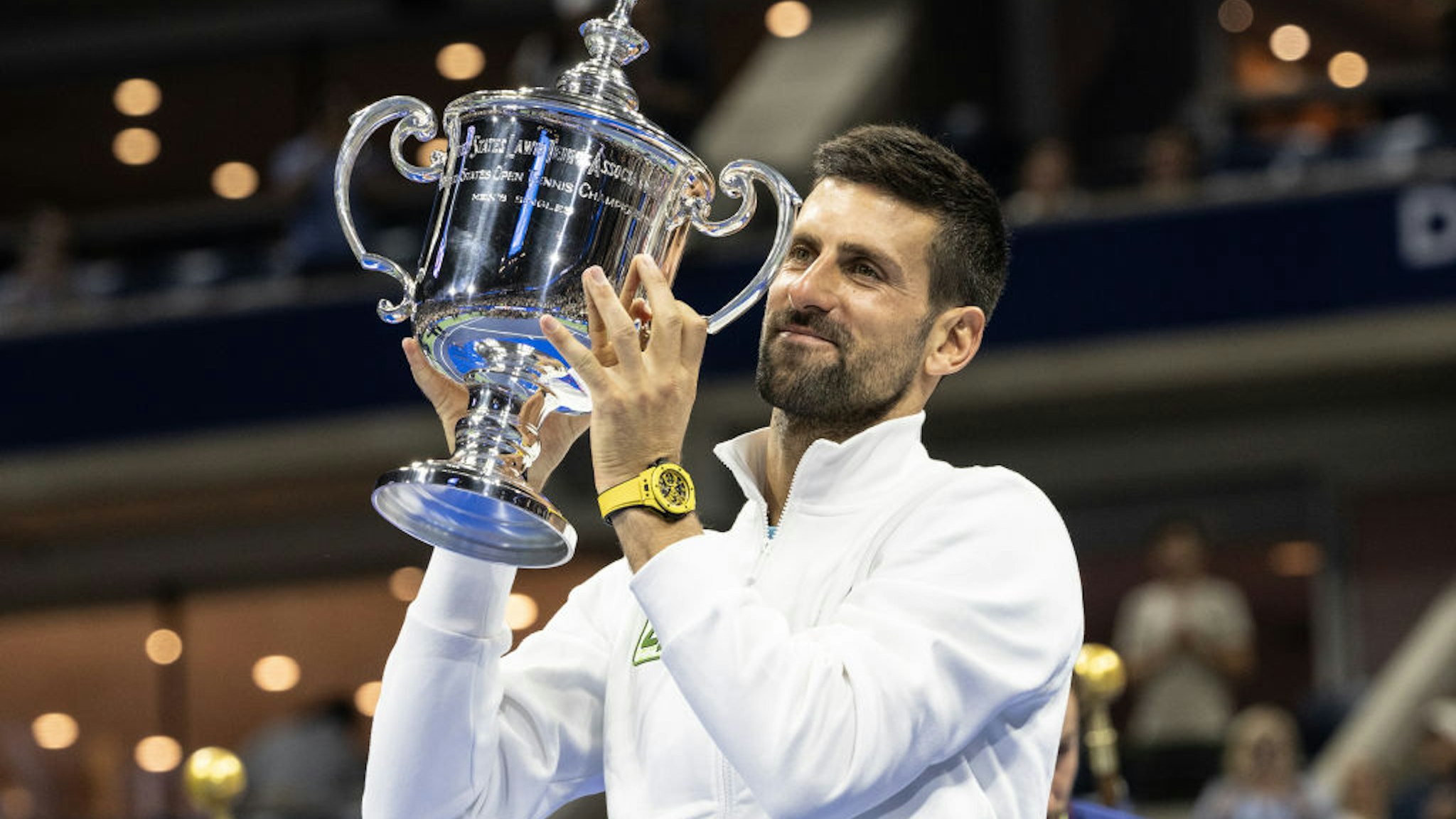 Novak Djokovic of Serbia poses with the championship trophy after winning the final against Daniil Medvedev of US Open Championships at Billie Jean King Tennis Center in New York on September 10, 2023.