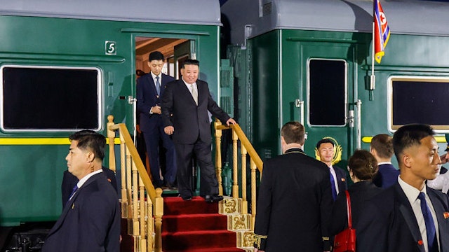 VLADIVOSTOK, RUSSIA - SEPTEMBER 12 : (----EDITORIAL USE ONLY MANDATORY CREDIT - 'PRIMORSKY KRAI / HANDOUT' - NO MARKETING NO ADVERTISING CAMPAIGNS - DISTRIBUTED AS A SERVICE TO CLIENTS----) North Korea leader Kim Jong Un is welcomed by Minister of Natural Resources and Ecology of Russia Alexander Kozlov after arriving at Vladivostok by armored train to attend a meeting with Russian President Vladimir Putin (not seen) in Vladivostok, Russia, on September 12, 2023.