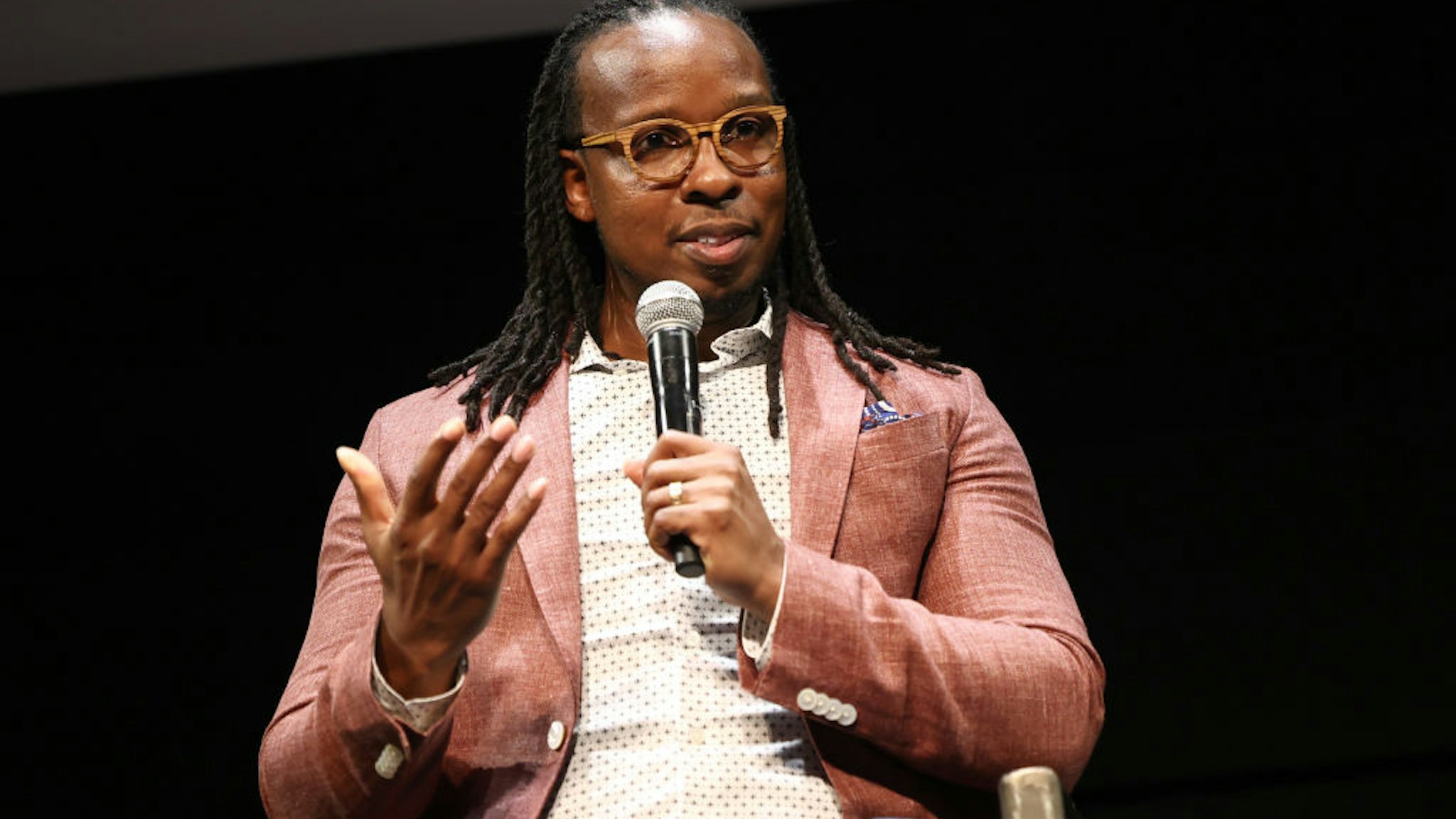 TORONTO, ONTARIO - SEPTEMBER 09: Dr. Ibram X. Kendi speaks onstage during Netflix's "Stamped From The Beginning" world premiere during the Toronto International Film Festival at TIFF Bell Lightbox on September 09, 2023 in Toronto, Ontario.