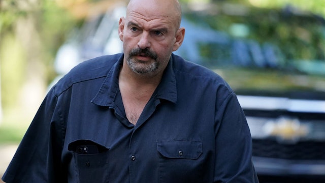 WASHINGTON, DC - SEPTEMBER 13: U.S. Sen. John Fetterman (D-PA) arrives for the “AI Insight Forum” at the Russell Senate Office Building on Capitol Hill on September 13, 2023 in Washington, DC. Lawmakers are seeking input from business leaders in the artificial intelligence sector, and some of their most ardent opponents, for writing legislation governing the rapidly evolving technology. (Photo by Nathan Howard/Getty Images)
