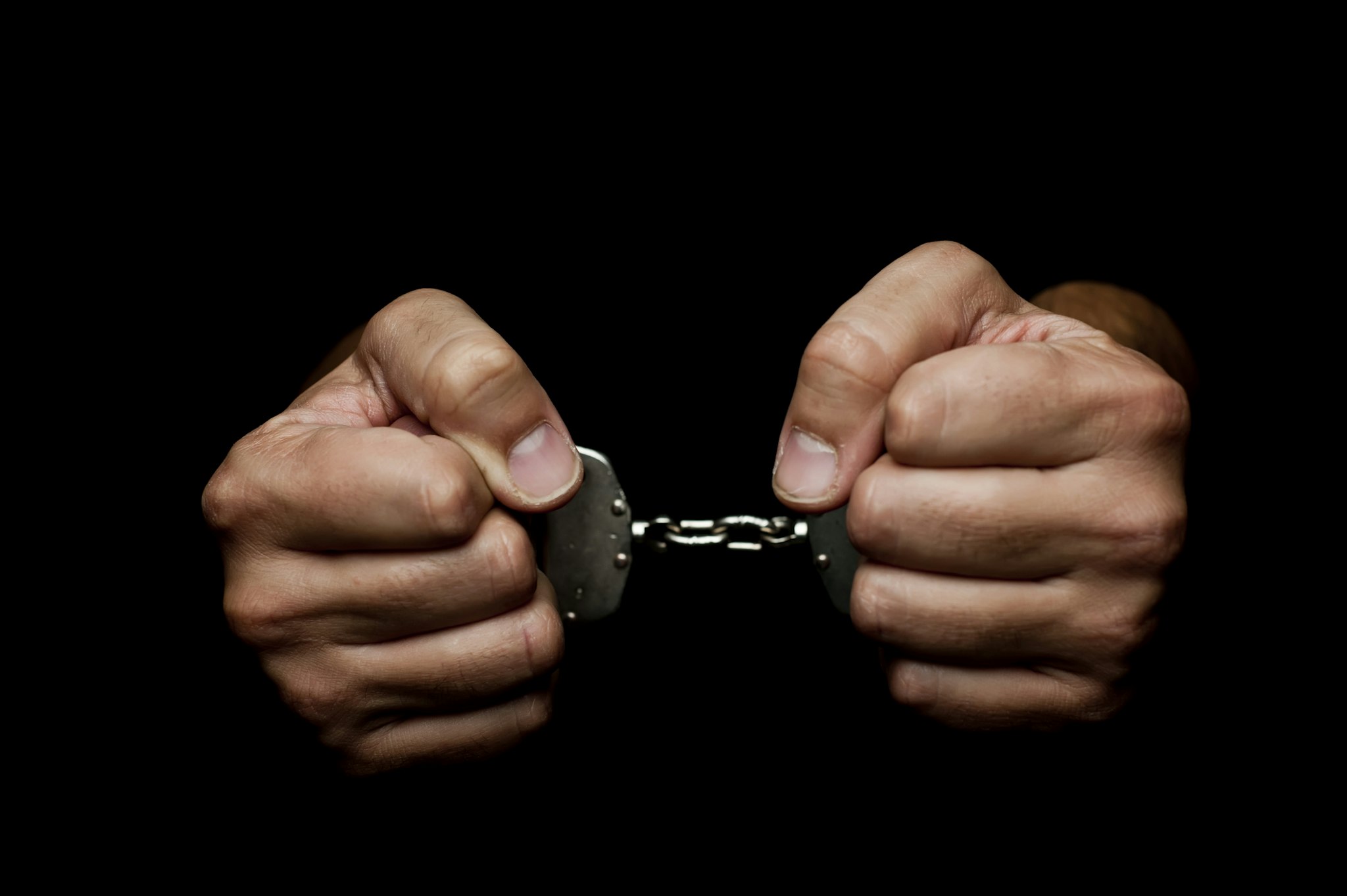 Handcuffs - stock photo