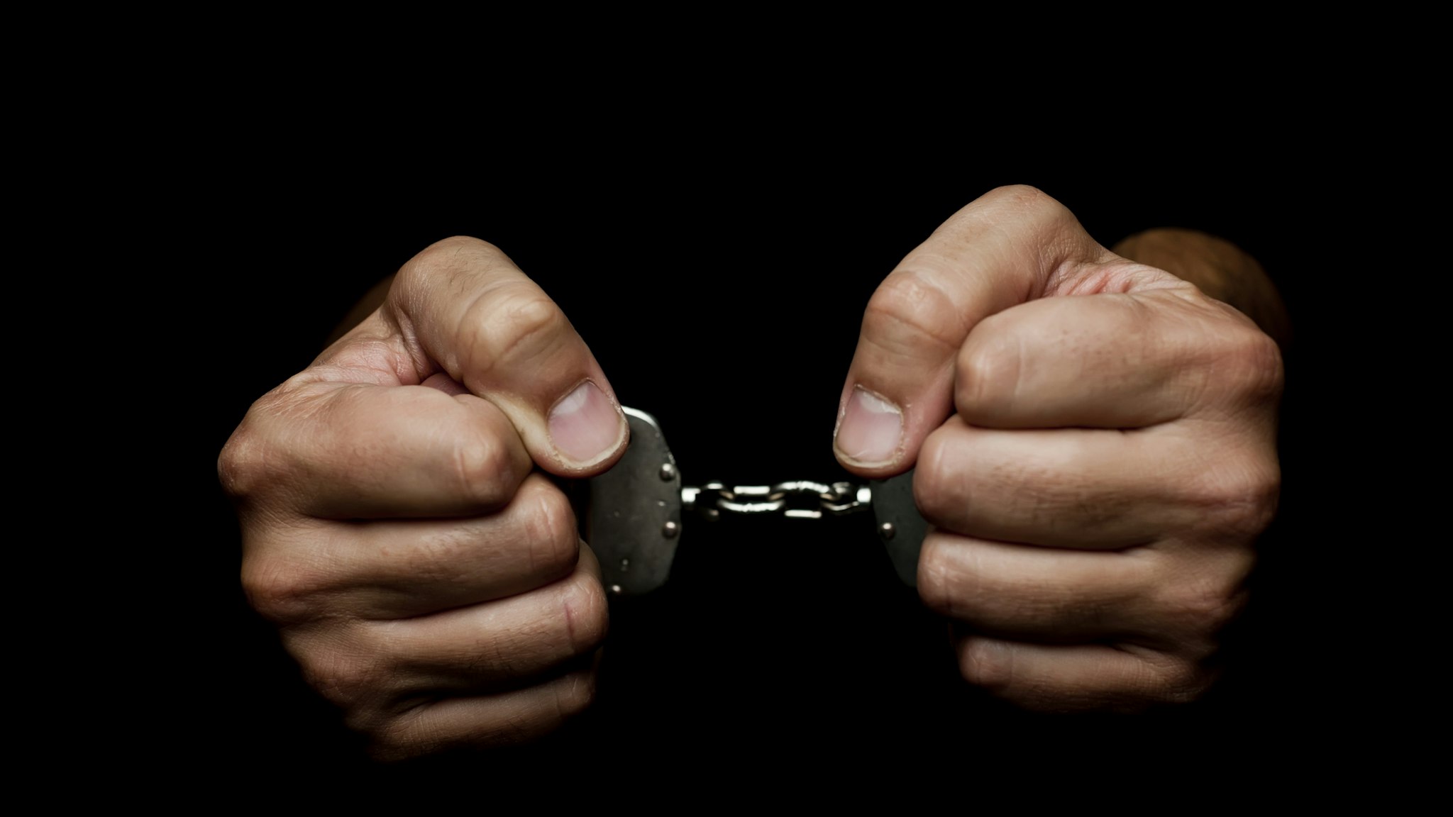 Handcuffs - stock photo