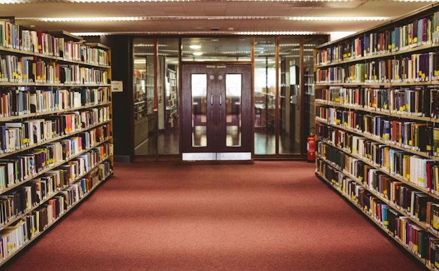 Wavebreakmedia. Getty Images. Entrance to the college library in the university