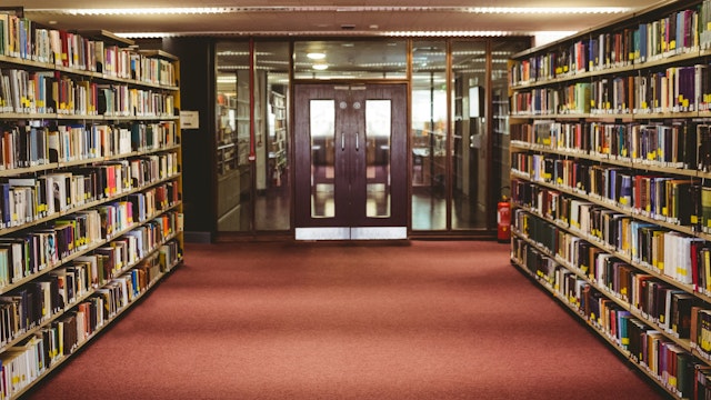 Wavebreakmedia. Getty Images. Entrance to the college library in the university