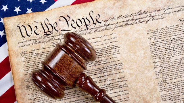 Bill of rights, we the people with wooden gavel and American flag.