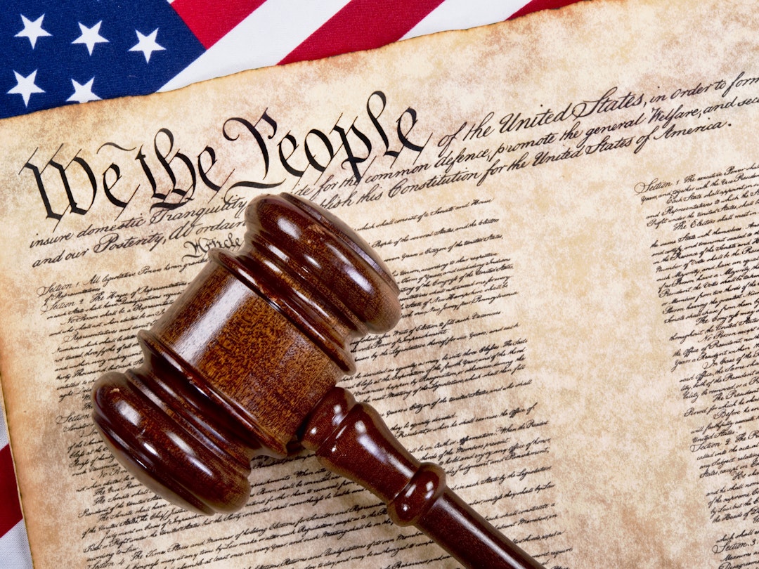 Bill of rights, we the people with wooden gavel and American flag.