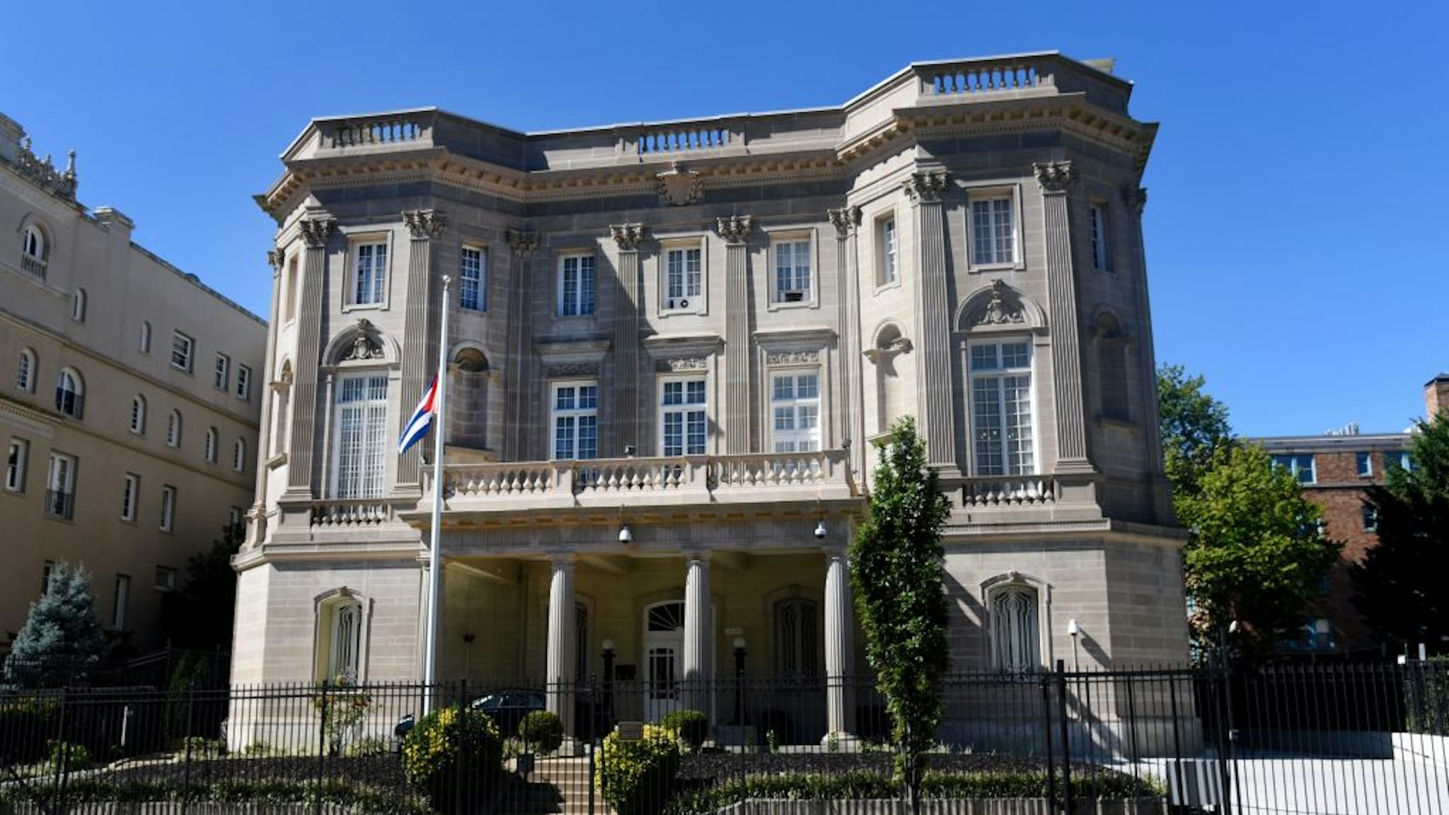 WASHINGTON, DC - OCTOBER 03: The Cuban flag waves outside of the Embassy of Cuba in Washington, DC on October 3, 2017 in Washington, DC. The U.S. orders on Tuesday the expulsion of 15 Cuban Diplomats from the washington DC Embassy.