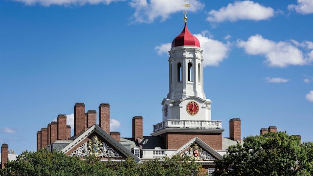 HARVARD UNIVERSITY, CAMBRIDGE, MASSACHUSETTS, UNITED STATES - 2015/10/18: Dunster House dormitory with clock tower, Harvard University.