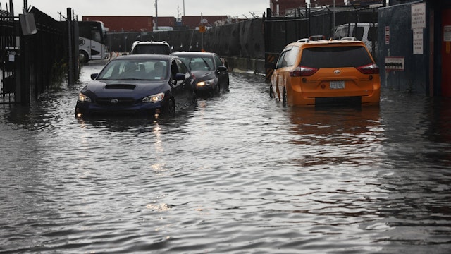 Cars sit stuck in the flooded streets in the Red Hook neighborhood on September 29, 2023 in the Brooklyn borough of New York City.
