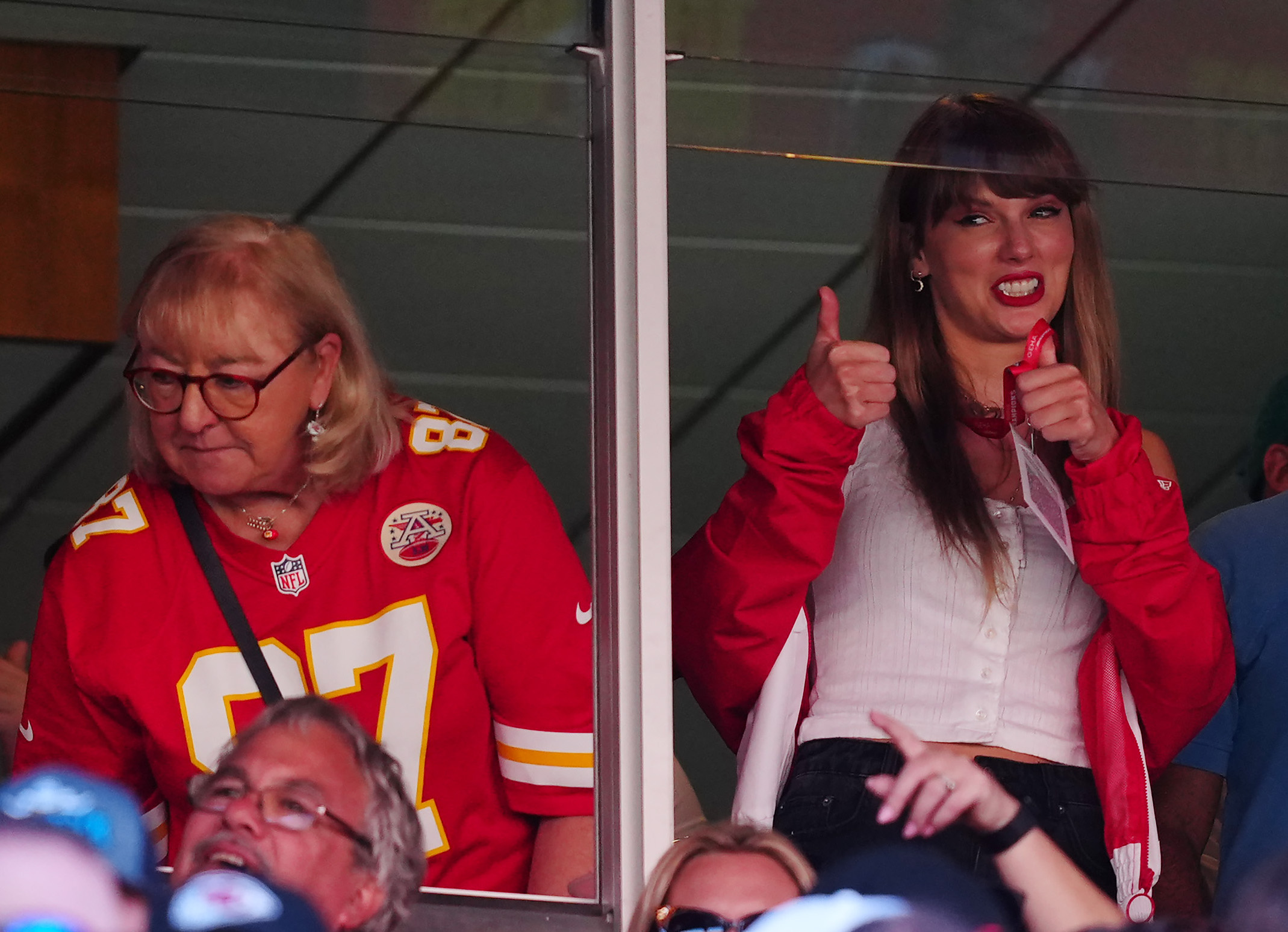 Taylor Swift seen exiting Chiefs game with Travis Kelce.