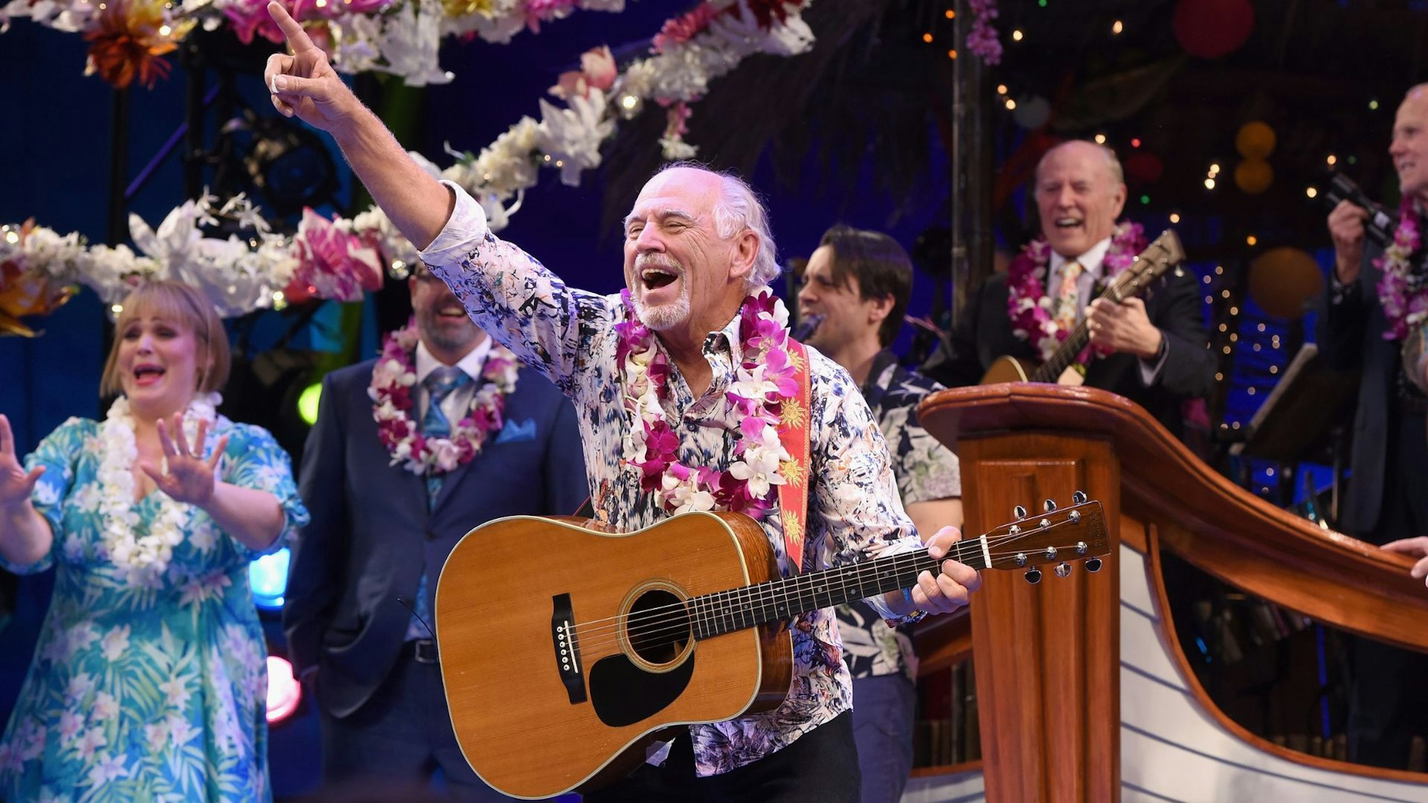 NEW YORK, NY - MARCH 15: Jimmy Buffett (C) takes opening night bow during the Broadway premiere of "Escape to Margaritaville" the new musical featuring songs by Jimmy Buffett at the Marquis Theatre on March 15, 2018 in New York City. (