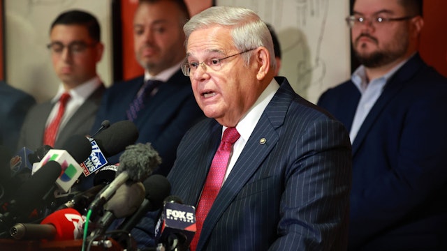 UNITED STATES -September 25: New Jersey Sen. Bob Menendez flanked by supporters is pictured during a full room press conference at the Hudson County Community College - North Hudson Campus in Union City, NJ, Monday September 25, 2023. It's the first time the Senator spoke publicly since being indicted on federal bribery charges last week by the US Attorney Damian Williams of the Southern District of New York. During the press conference Senator Menendez denied the charges and vowed to remain in office.