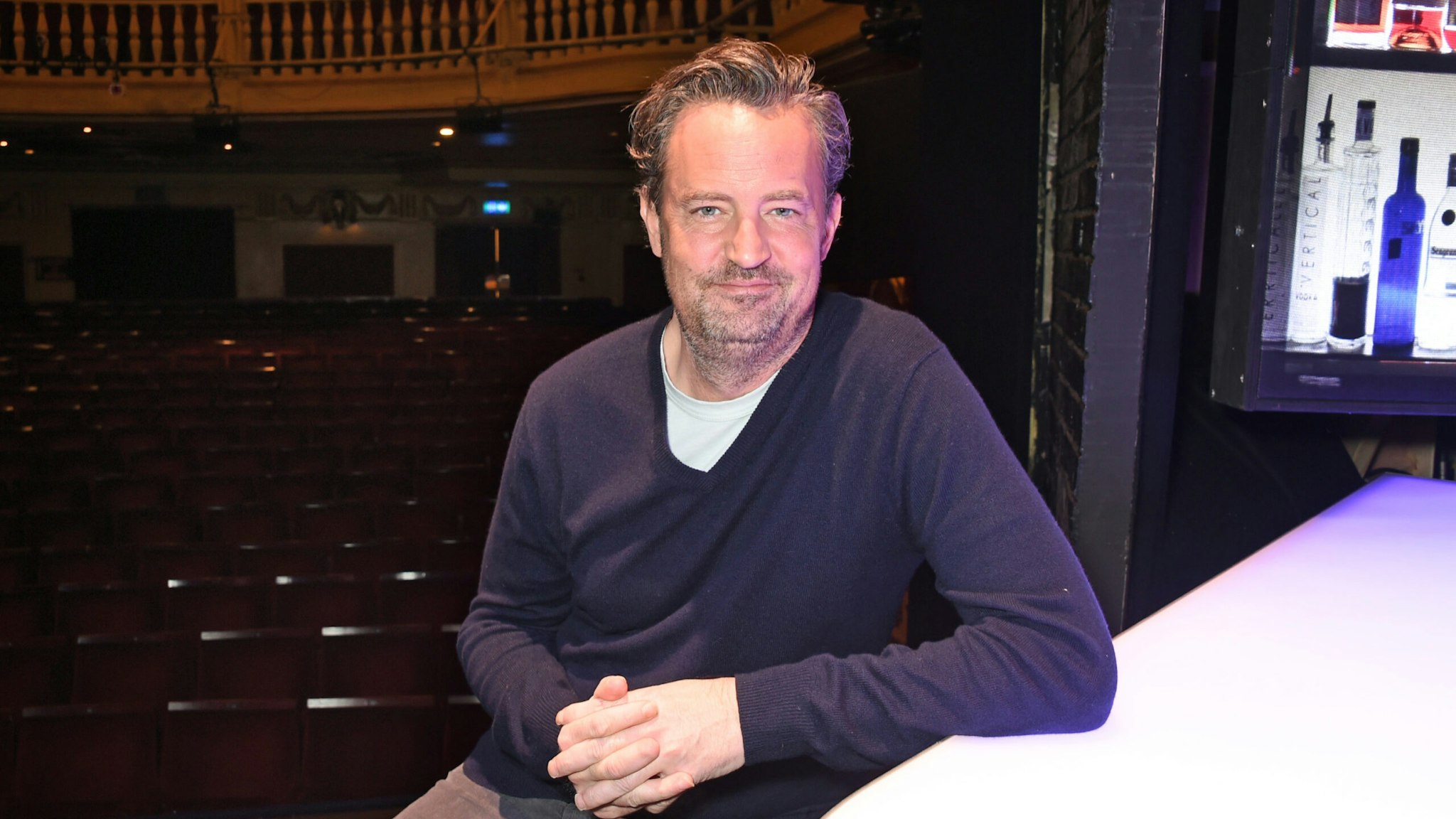 Matthew Perry poses at a photocall for "The End Of Longing", a new play which he wrote and stars in at The Playhouse Theatre, on February 8, 2016 in London, England.