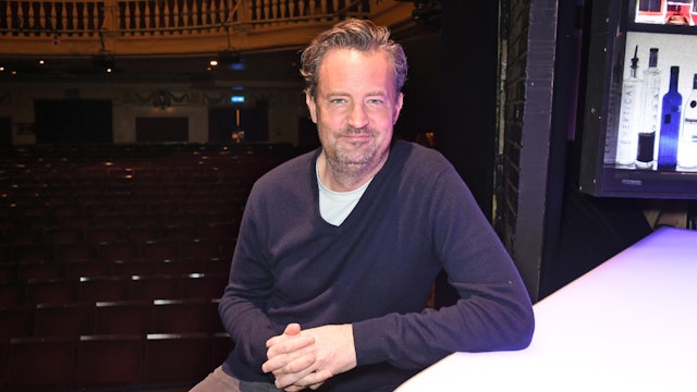 Matthew Perry poses at a photocall for "The End Of Longing", a new play which he wrote and stars in at The Playhouse Theatre, on February 8, 2016 in London, England.