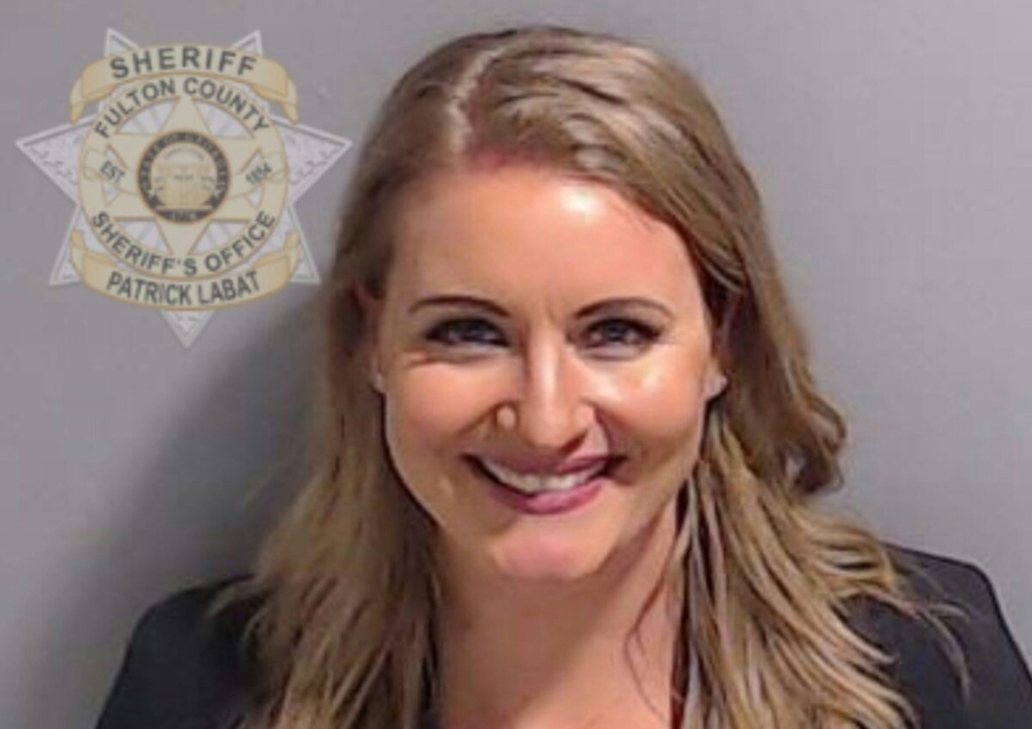 ATLANTA, GEORGIA - AUGUST 23: In this handout provided by the Fulton County Sheriff's Office, former Trump lawyer Jenna Ellis poses for her booking photo on August 23, 2023 in Atlanta, Georgia. Former President Donald Trump and 18 others facing felony charges in the indictment related to tampering with the 2020 election in Georgia have been ordered to turn themselves in by August 25.
