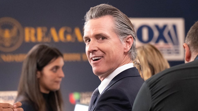 Simi Valley, CA - September 27:Simi Valley, CA - September 27:California Governor Gavin Newsom talks with media in the "Spin Room" before the start of the second GOP debate at the Ronald Reagan Presidential Library in Simi Valley, CA, Wednesday, September 27, 2023.