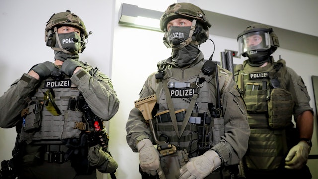 Members of Grenzschutzgruppe 9 (GSG 9; English: Border Protection Group 9) during a visit by the German interior minister Thomas de Maiziere (CDU) to the headquarters of a new elite police unit in Berlin, Germany, 8 August 2017. The unit was set up to handle extremely complex operations such as anti-terror operations. The unit comprises members of a number of different elite tactical units including GSG 9.