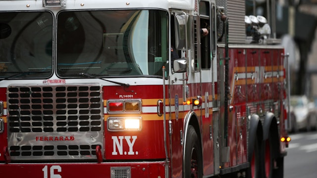 NEW YORK, USA - APRIL 12: A fire truck is seen as firefighters and New Yorkers cheered for healthcare workers who risk their lives to serve for new type of coronavirus (COVID-19) patients in New York City, United States on April 12, 2020. (Photo by Tayfun Coskun/Anadolu Agency via Getty Images)
