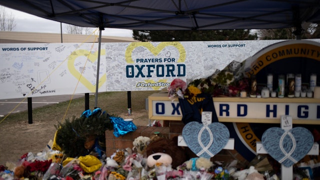 OXFORD, MI - DECEMBER 07: A board where community members can share words of support alongside the memorial outside of Oxford High School on December 7, 2021 in Oxford, Michigan. One week ago, four students were killed and seven others injured on November 30, when student Ethan Crumbley allegedly opened fire with a pistol at the school.15-year-old Ethan Crumbley has been charged along with his parents James and Jennifer Crumbley who have been charged with four counts of involuntary manslaughter