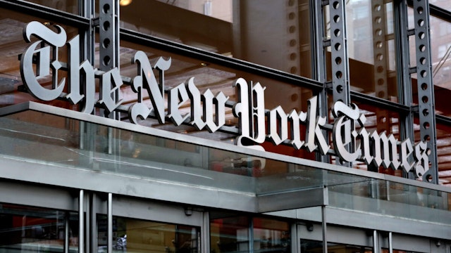 NEW YORK, NY - APRIL 29: The New York Times logo hangs above a doorway of their corporate headquarters on April 29, 2023, in New York City.