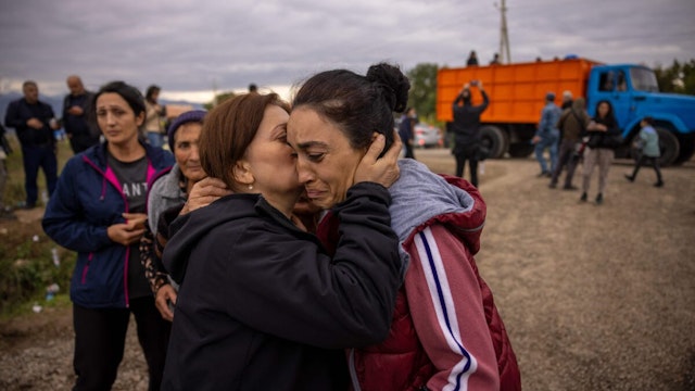 09/26/2023 Kornidzor, Armenia. Refugees from Nagorno- Karabakh passing through Kornidzor reunite and embrace one another in both happiness and sadness. The days continue to be filled with uncertainty and emotion.
