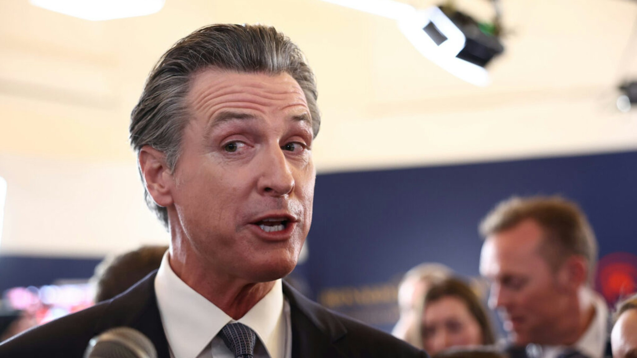 California Gov. Gavin Newsom talks to reporters in the spin room following the FOX Business Republican Primary Debate at the Ronald Reagan Presidential Library on September 27, 2023 in Simi Valley, California.