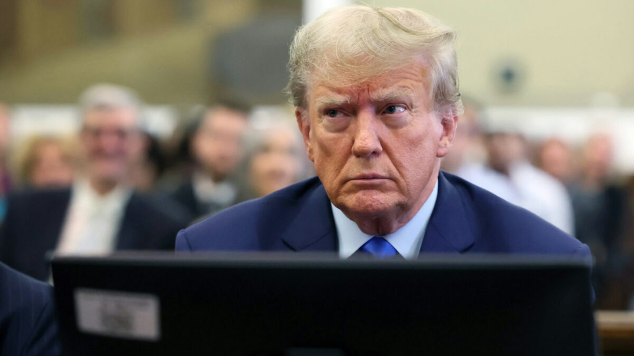 Former U.S. President Donald Trump appears in the courtroom with his lawyers for the start of his civil fraud trial at New York State Supreme Court on October 02, 2023 in New York City