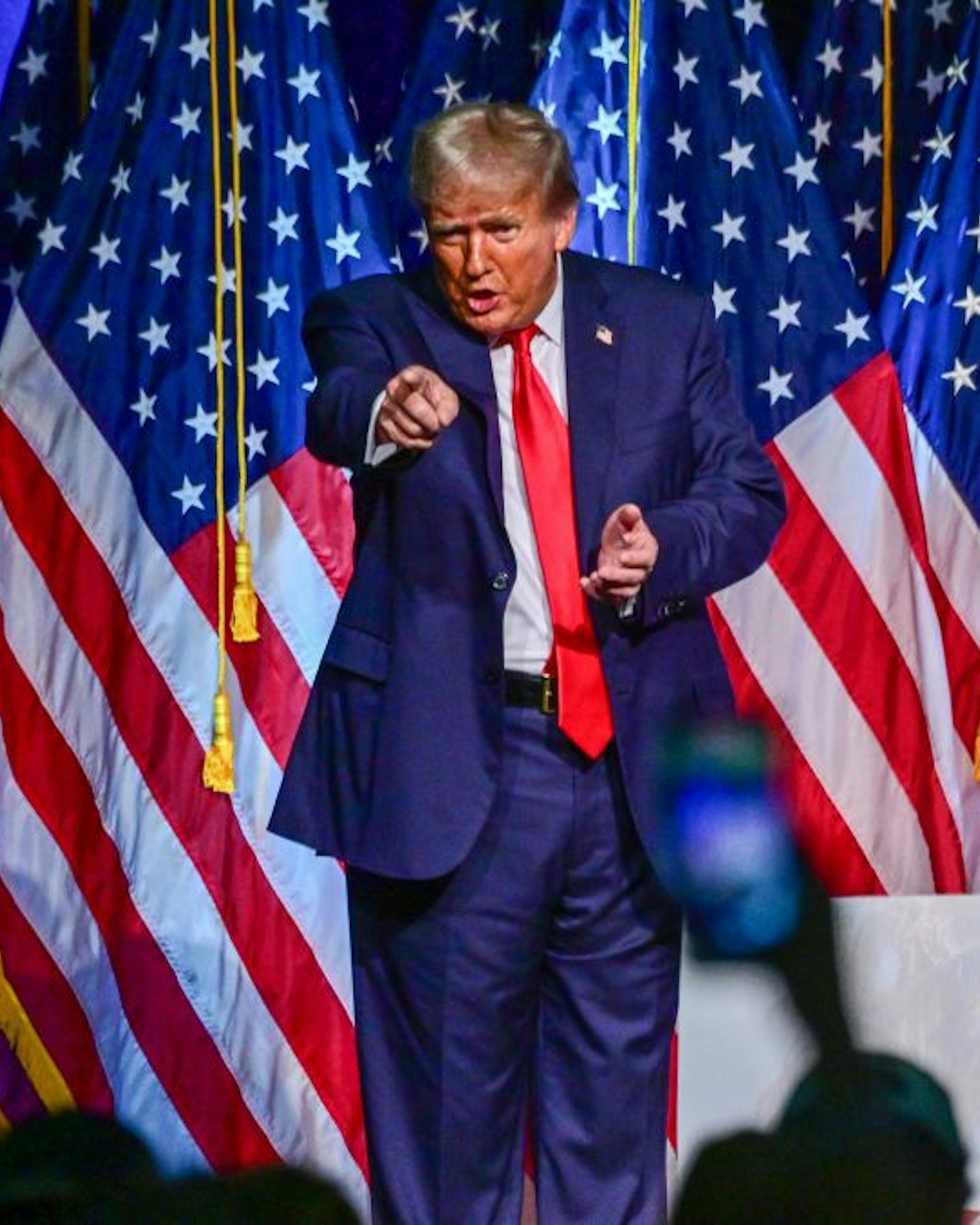 TOPSHOT - Former US President and 2024 Republican presidential hopeful Donald Trump gestures at the end of a campaign event at Club 47 USA in West Palm Beach, Florida, on October 11, 2023. (Photo by GIORGIO VIERA / AFP) (Photo by GIORGIO VIERA/AFP via Getty Images)