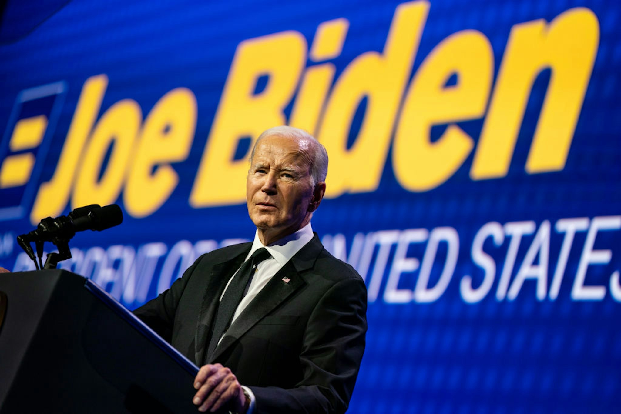 WASHINGTON, DC - OCTOBER 14: US President Joe Biden delivers remark on stage during the 2023 Human Rights Campaign National Dinner at the Washington Convention Center on October, 14, 2023 in Washington, DC.