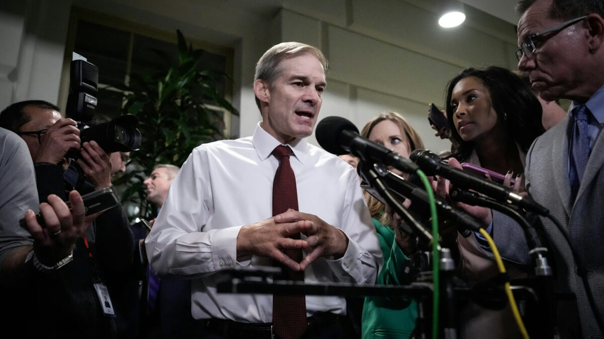Rep. Jim Jordan (R-OH) speaks briefly to reporters as he departs a House Republican Caucus at the U.S. Capitol October 16, 2023 in Washington, DC.